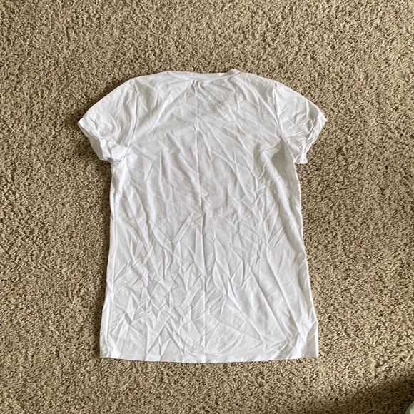 Track & Field white exercise top with flower design | size: s - Picture 2 of 4